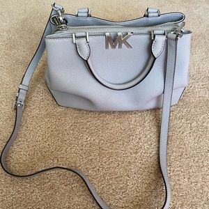 Gray and silver Michael Kor’s purse